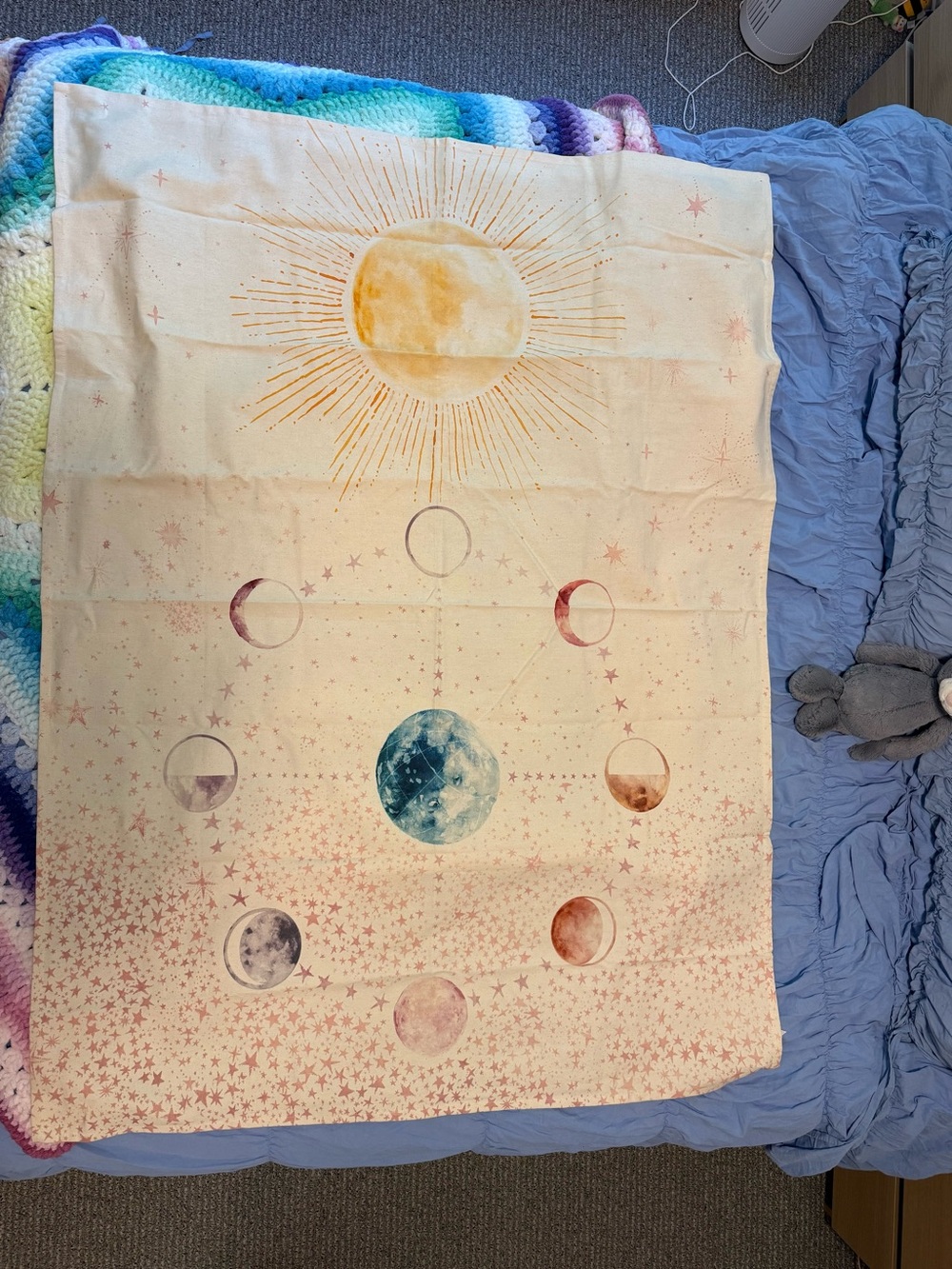 Urban Outfitters Sun and Moon Phase Tapestry in Cream, Yellow, Blue, Pink